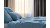 Thumbnail image of a tranquil bedroom scene with soft lighting and comfortable bedding, suggesting rest