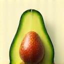 An iconic image of a vibrant green avocado with a pit, surrounded by other fresh produce, representing nutrition